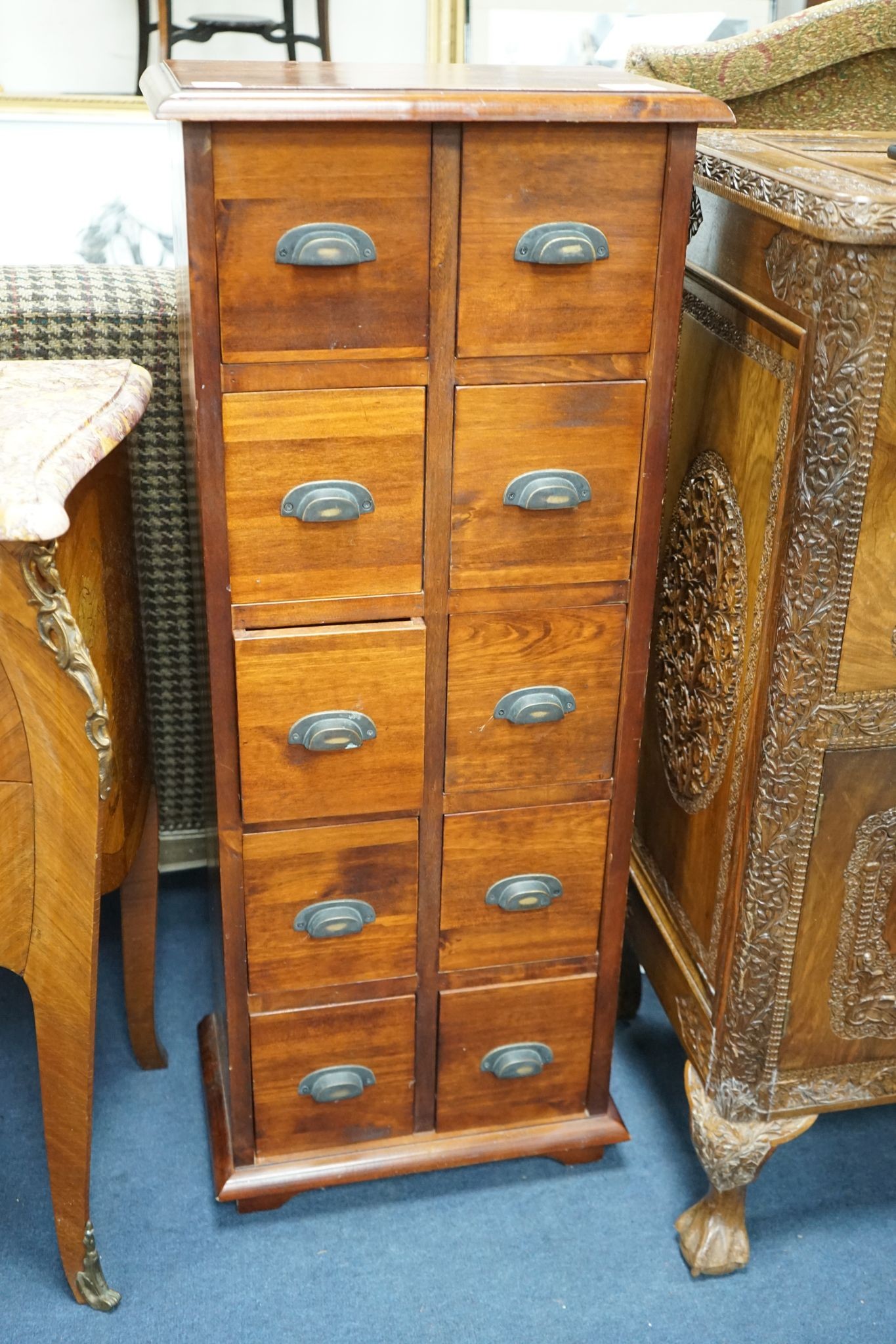 A reproduction hardwood ten drawer narrow chest, width 40cm, depth 26cm, height 102cm together with a glazed hardwood wall cabinet